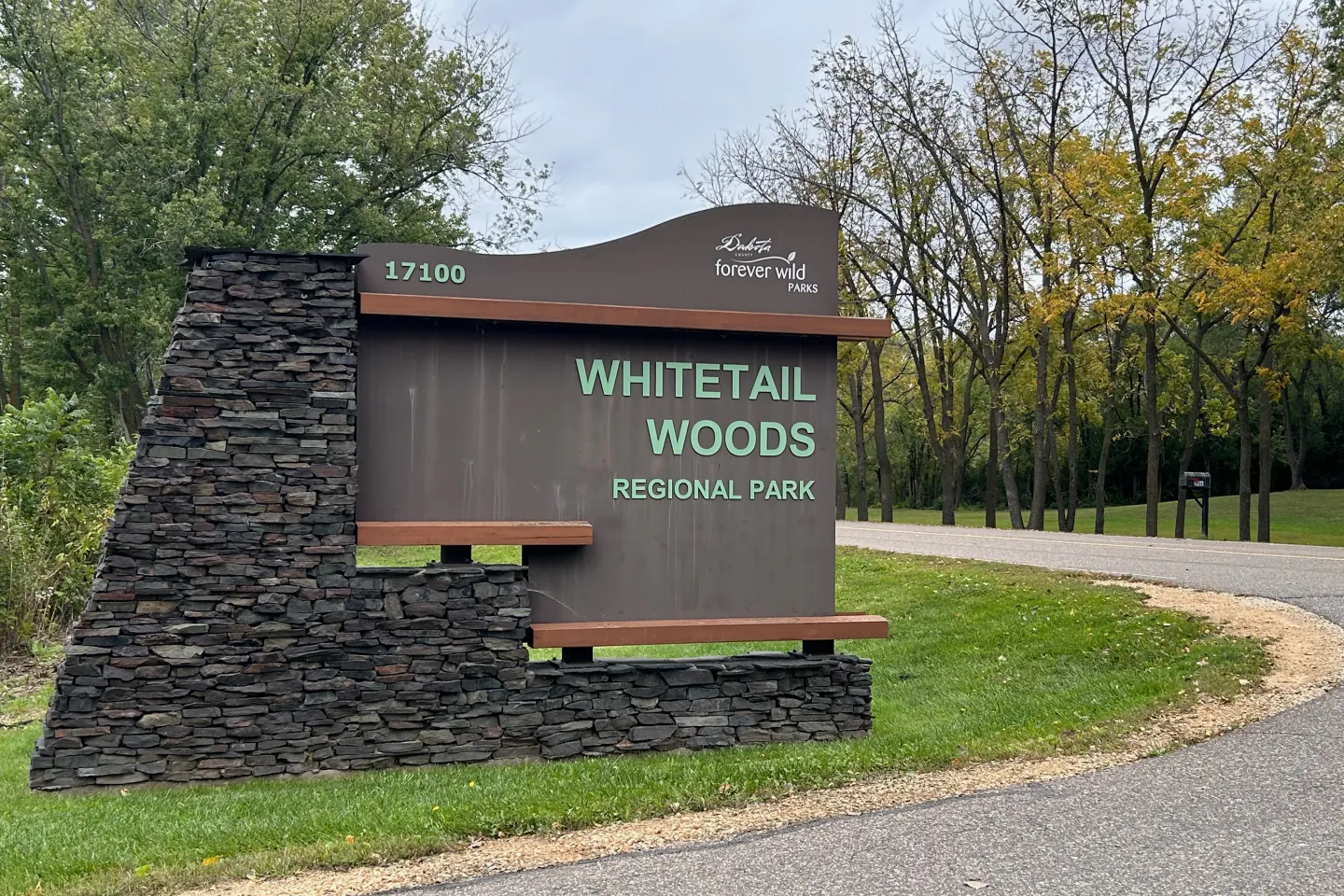 Whitetail Woods Regional Park entrance sign at 17100 Station Trail